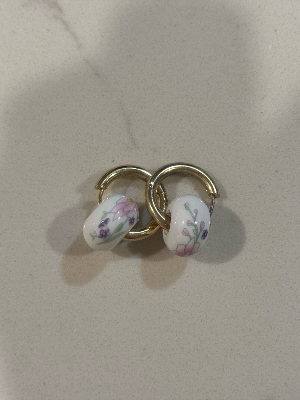 Gold Hoop Earrings with White Floral Ceramic Beads